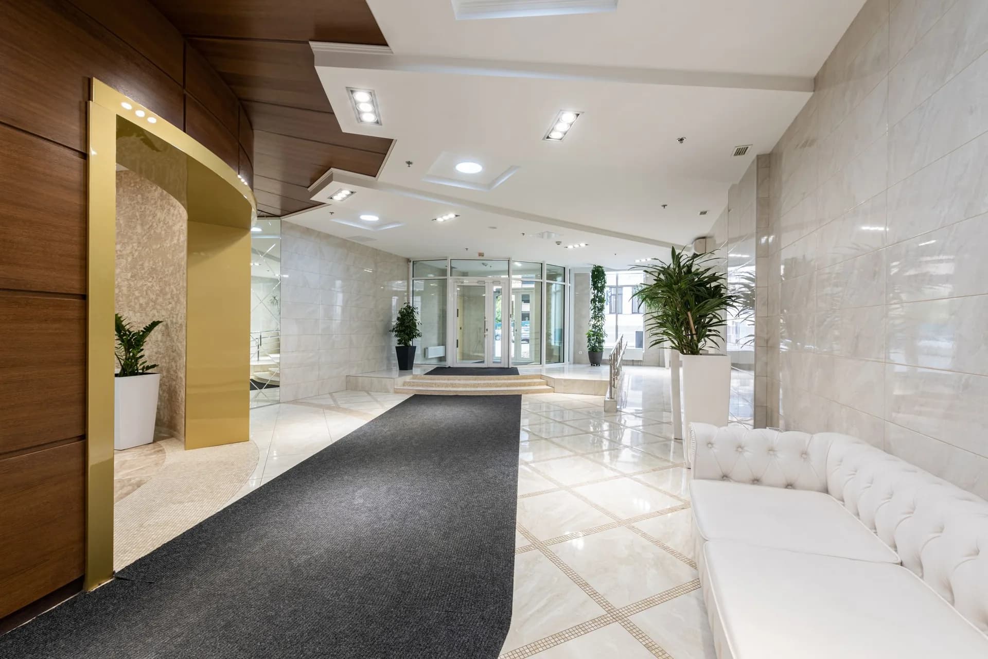 Bright finished commercial lobby with white walls