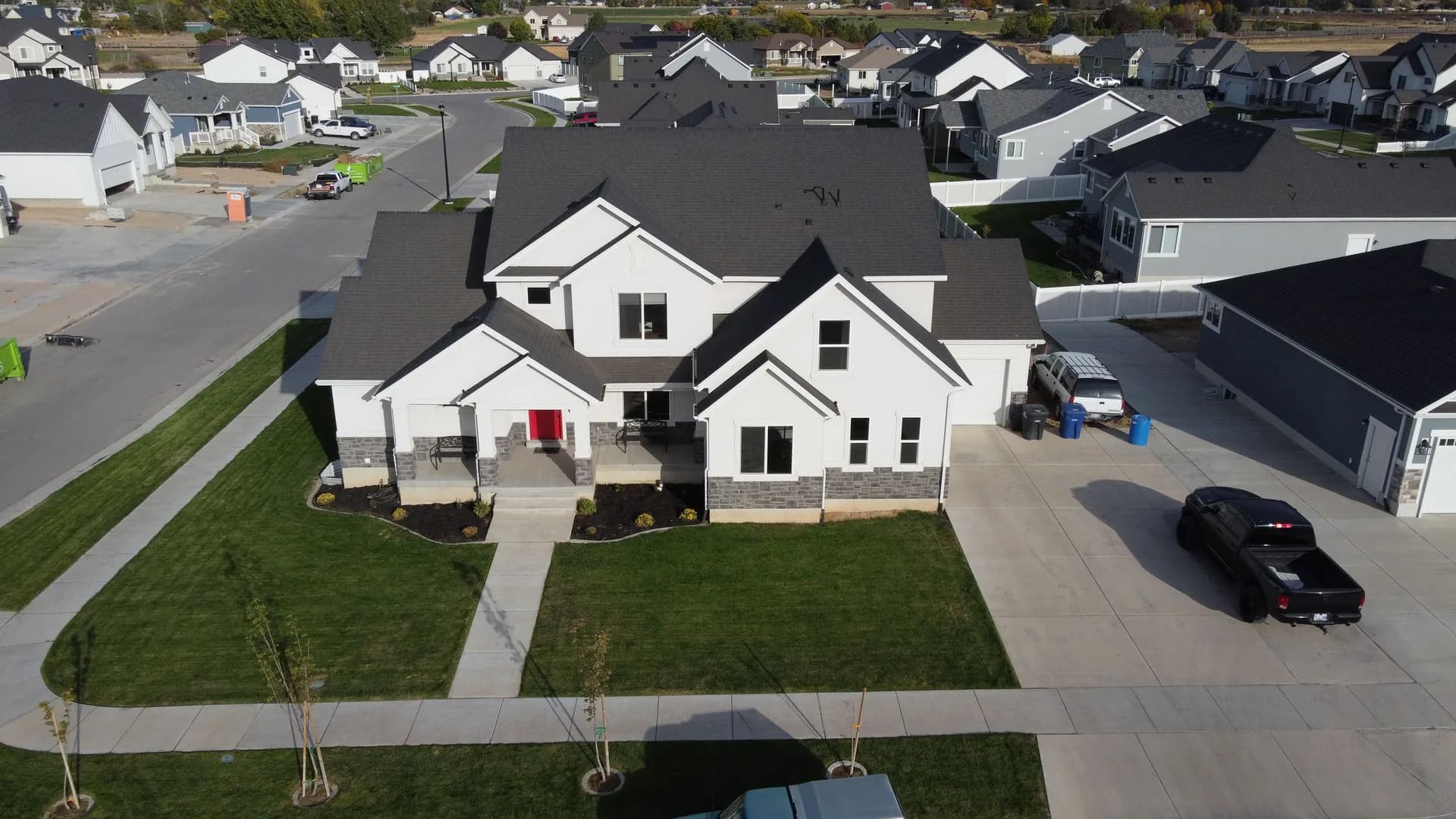 Aerial view of a modern white suburban home