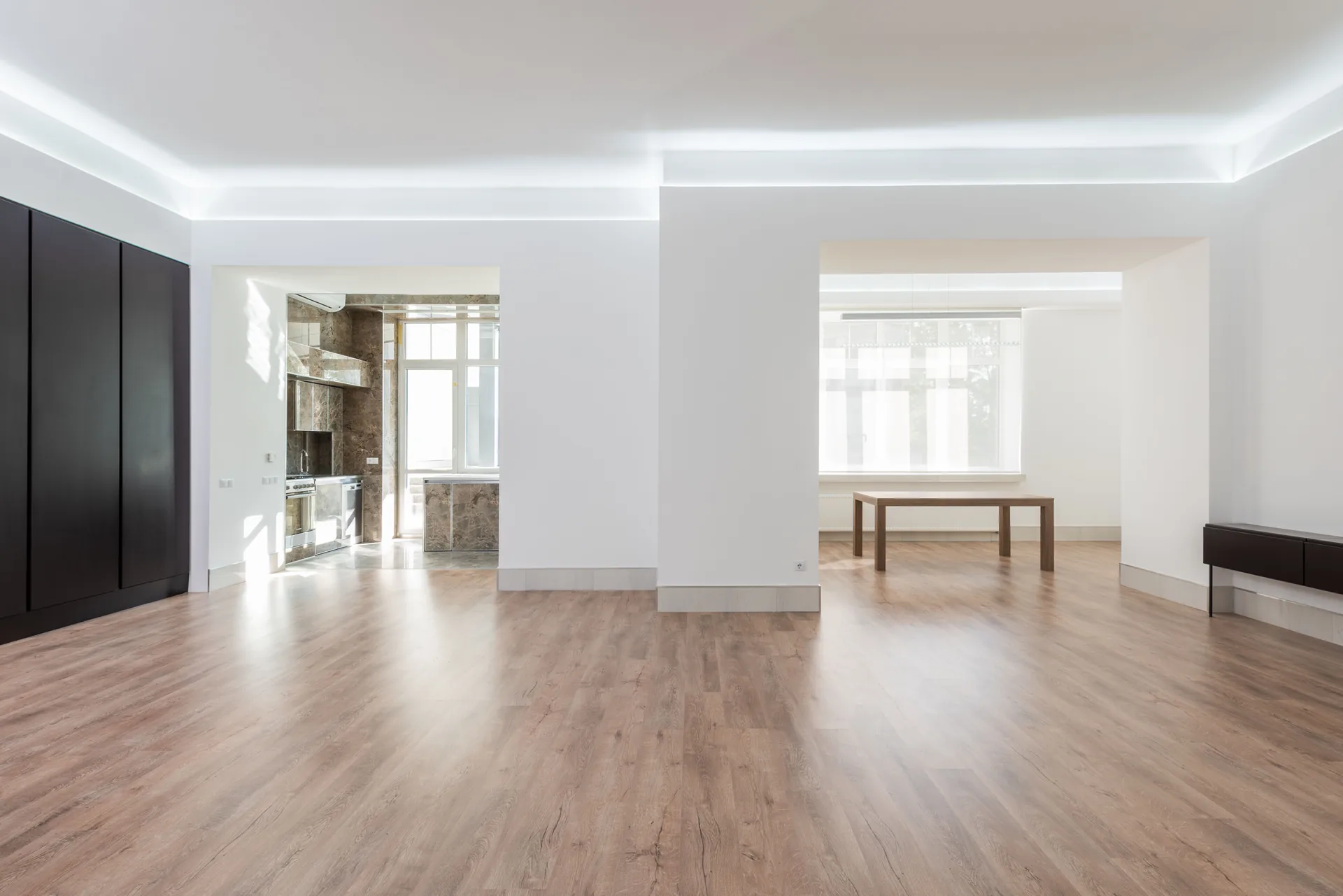 Bright modern home with connected rooms and wood floors
