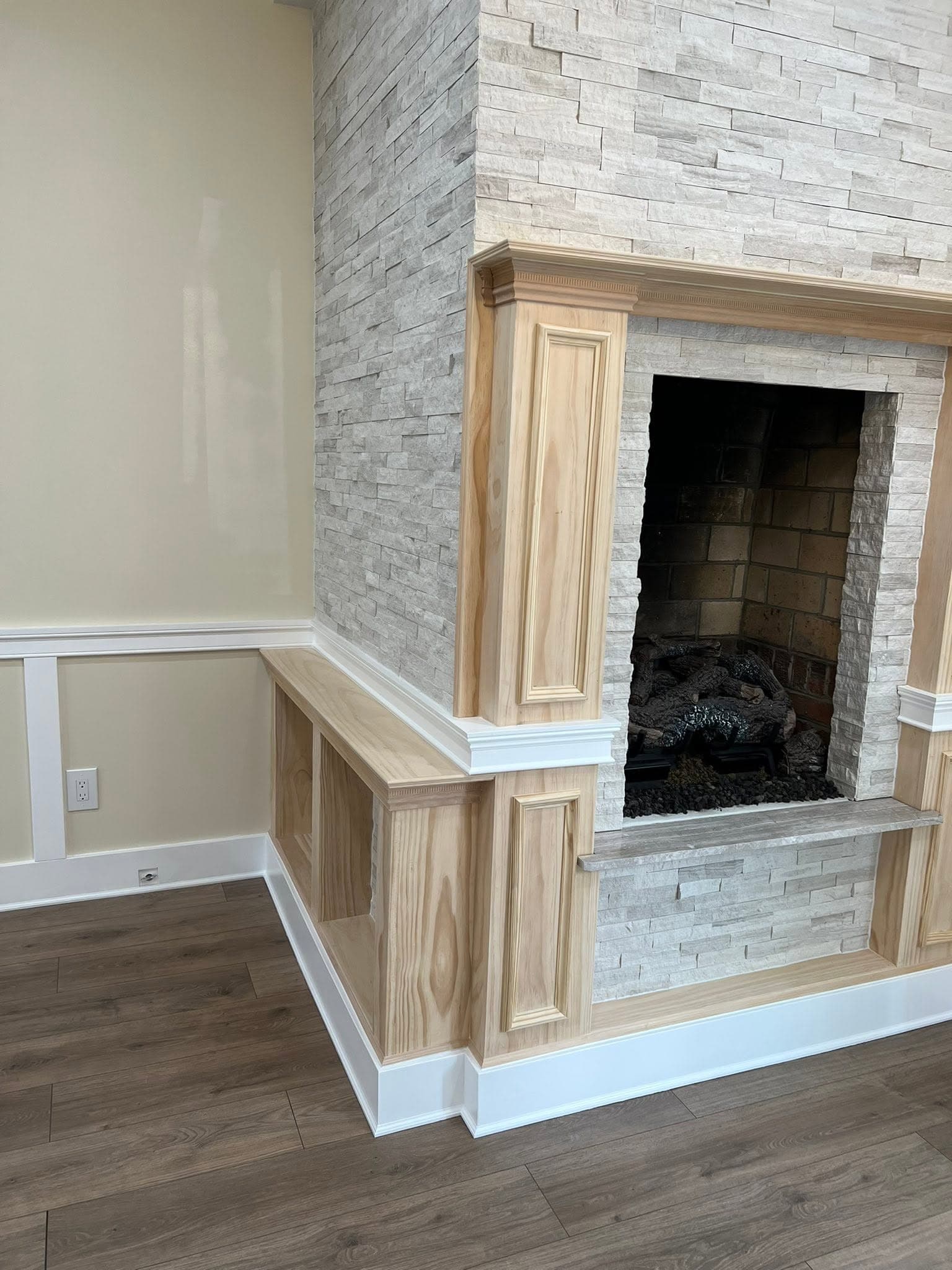 Room with stone-faced fireplace, after view 1
